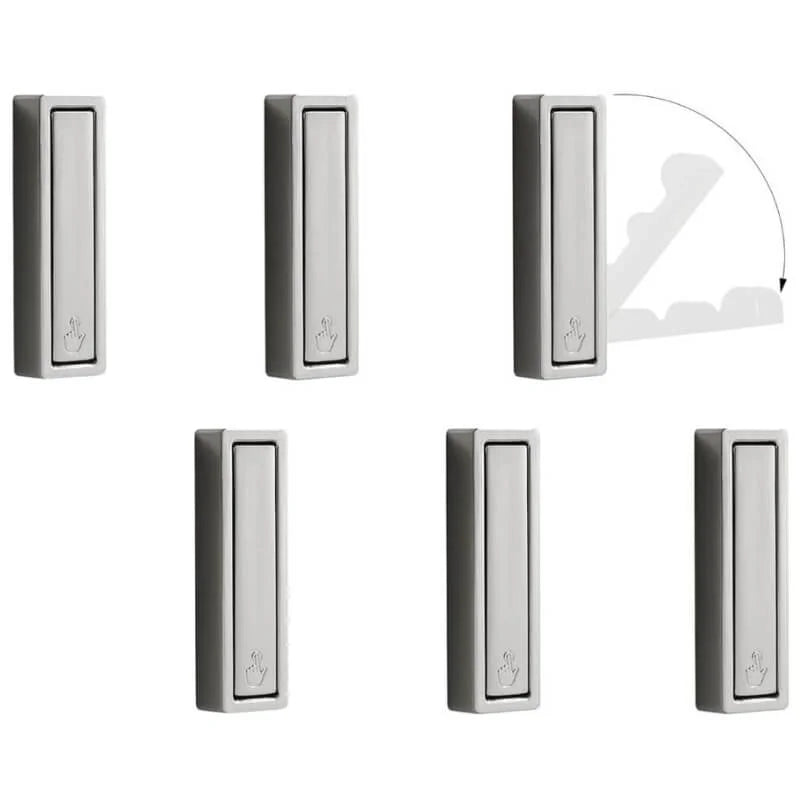 Folding coat hook folded flat against wall in small space