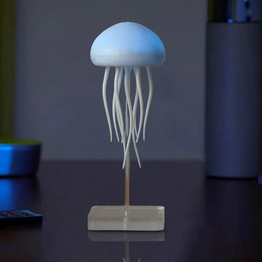 Cordless rechargeable table lamp with warm ambient glow on a shelf in an apartment