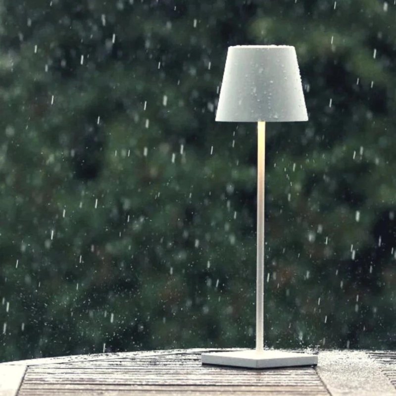 Waterproof cordless table lamp for outdoor entertaining