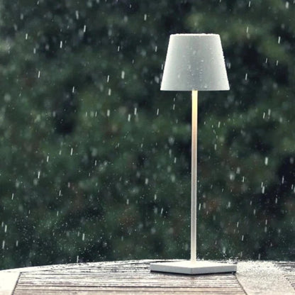 Waterproof cordless table lamp for outdoor entertaining