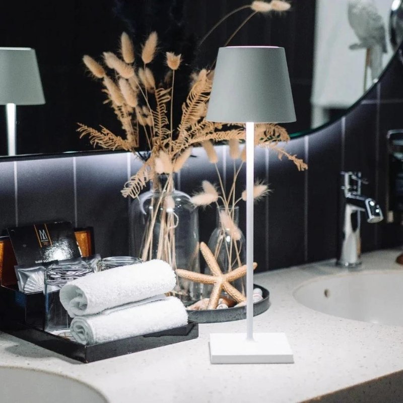 Waterproof cordless table lamp for outdoor entertaining