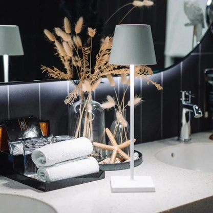 Waterproof cordless table lamp for outdoor entertaining