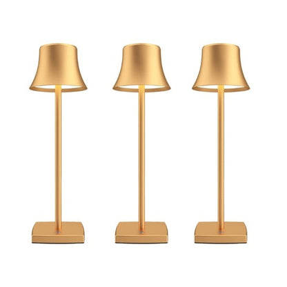 Cordless touch table lamp on a bedside table with soft warm light