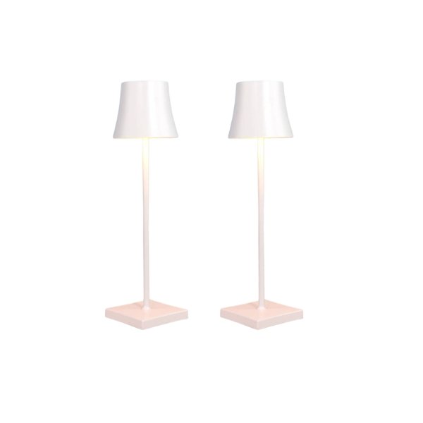 Cordless touch table lamp on a bedside table with soft warm light