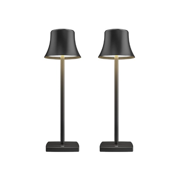 Cordless touch table lamp on a bedside table with soft warm light