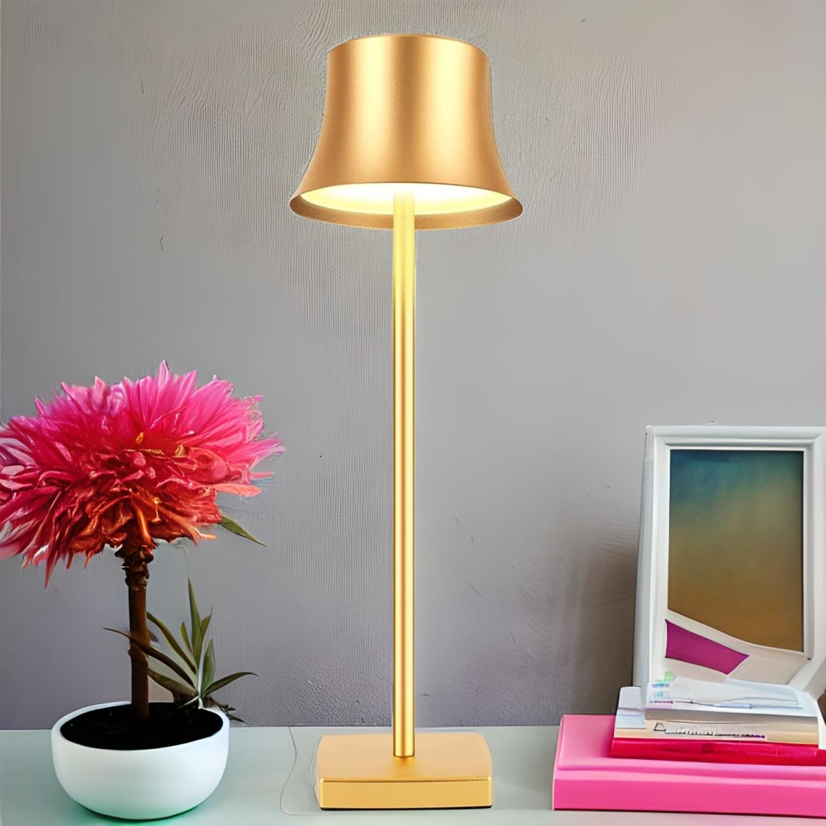 Cordless touch table lamp on a bedside table with soft warm light