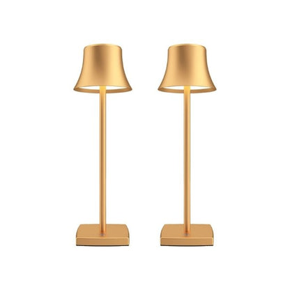 Cordless touch table lamp on a bedside table with soft warm light