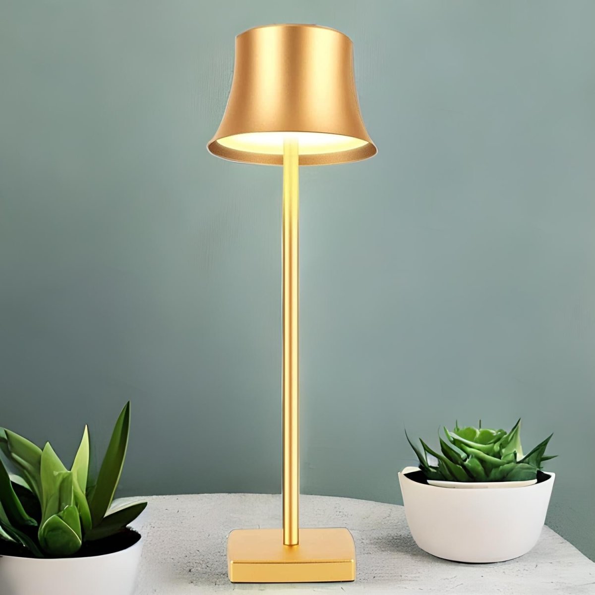 Cordless touch table lamp on a bedside table with soft warm light