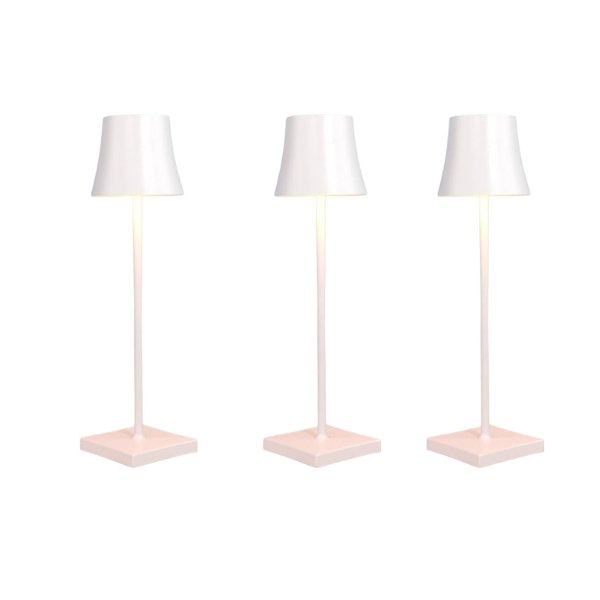 Cordless touch table lamp on a bedside table with soft warm light