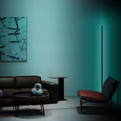 RGB corner floor lamp with colorful lighting modes for party ambiance in a living room