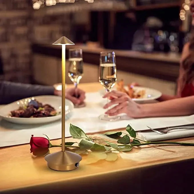 Cordless table lamp with warm ambient light on a patio, no cords
