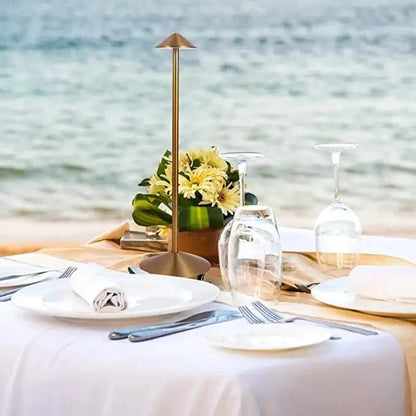 Cordless table lamp with warm ambient light on a patio, no cords