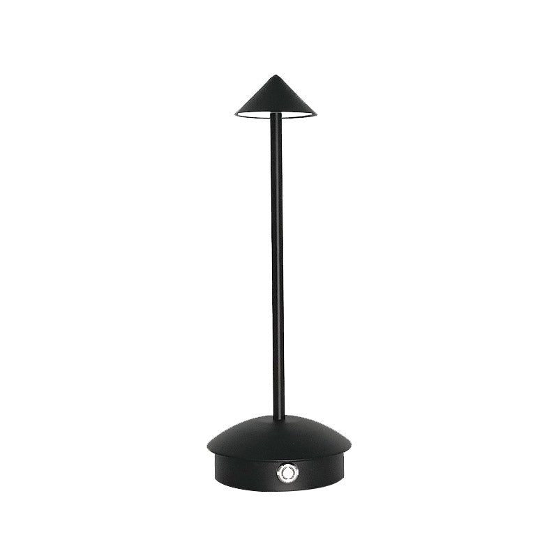 Cordless table lamp with warm ambient light on a patio, no cords