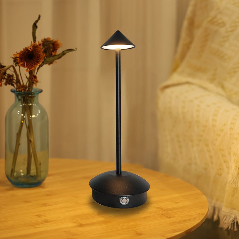 Cordless table lamp with warm ambient light on a patio, no cords