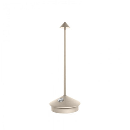 Cordless LED table lamp on a patio table for outdoor ambiance