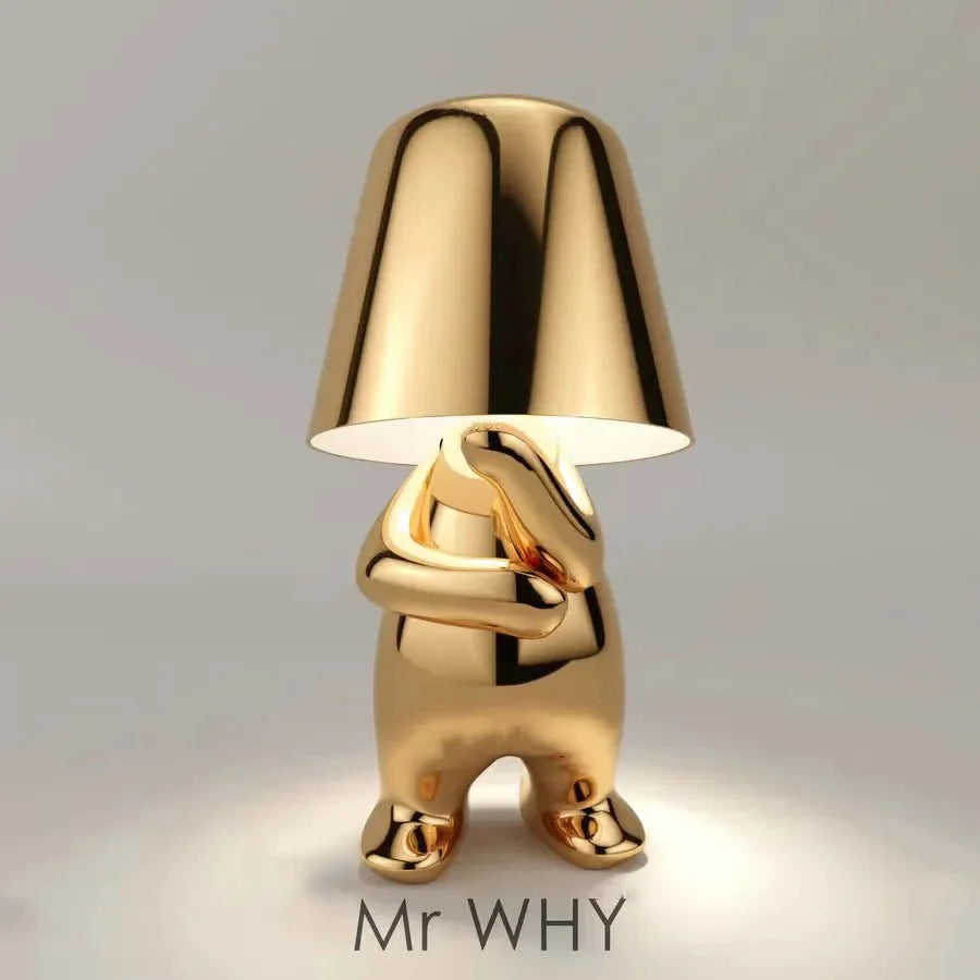 Cordless Thinker sculpture table lamp with frosted glass shade for modern decor