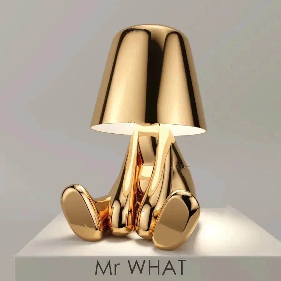 Cordless Thinker sculpture table lamp with frosted glass shade for modern decor