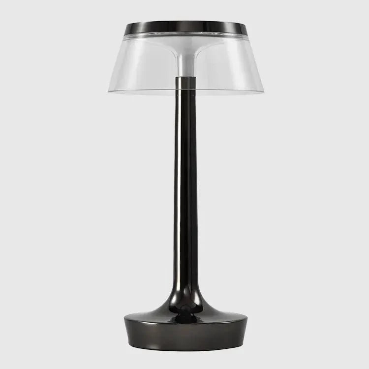 Cordless touch-controlled table lamp with warm glow on a nightstand in an apartment