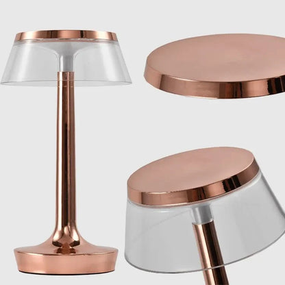 Cordless touch-controlled table lamp with warm glow on a nightstand in an apartment