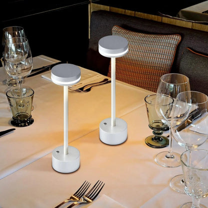 Portable cordless table lamp with aluminum body and round shade for camping and outdoor use