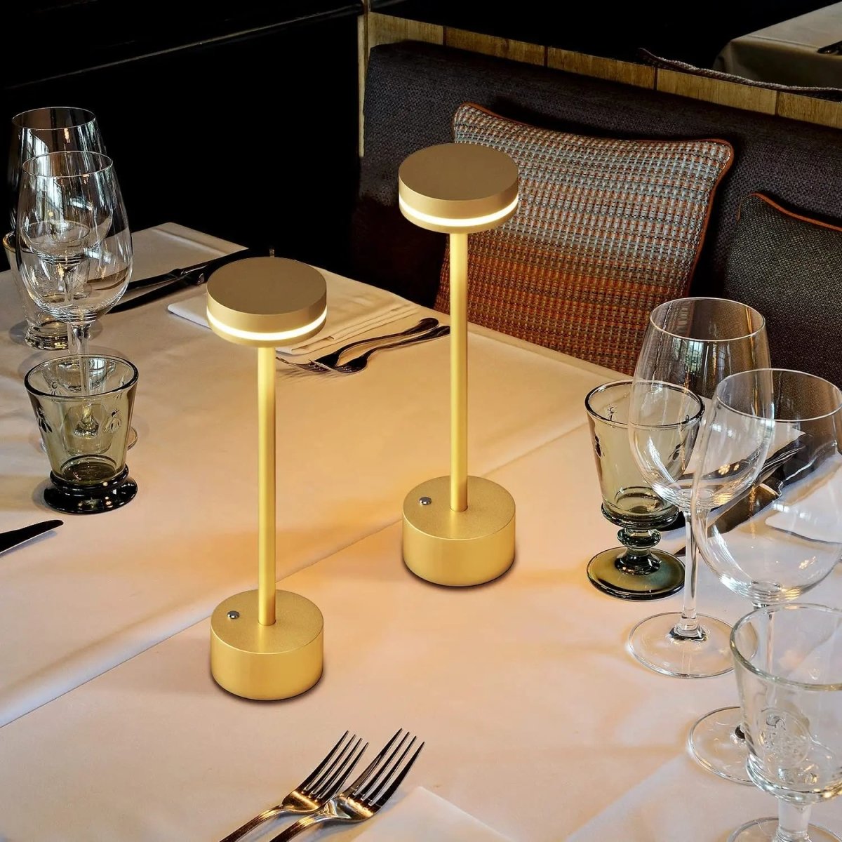 Portable cordless table lamp with aluminum body and round shade for camping and outdoor use