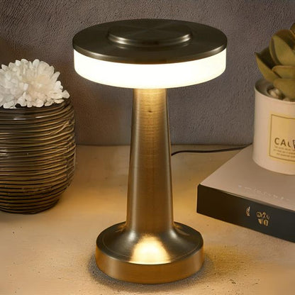 Cordless LED table lamp with touch dimmer on a nightstand in a nursery