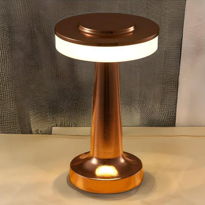 Cordless LED table lamp with touch dimmer on a nightstand in a nursery