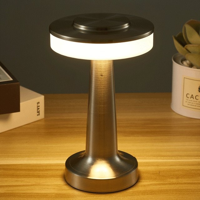 Cordless LED table lamp with touch dimmer on a nightstand in a nursery